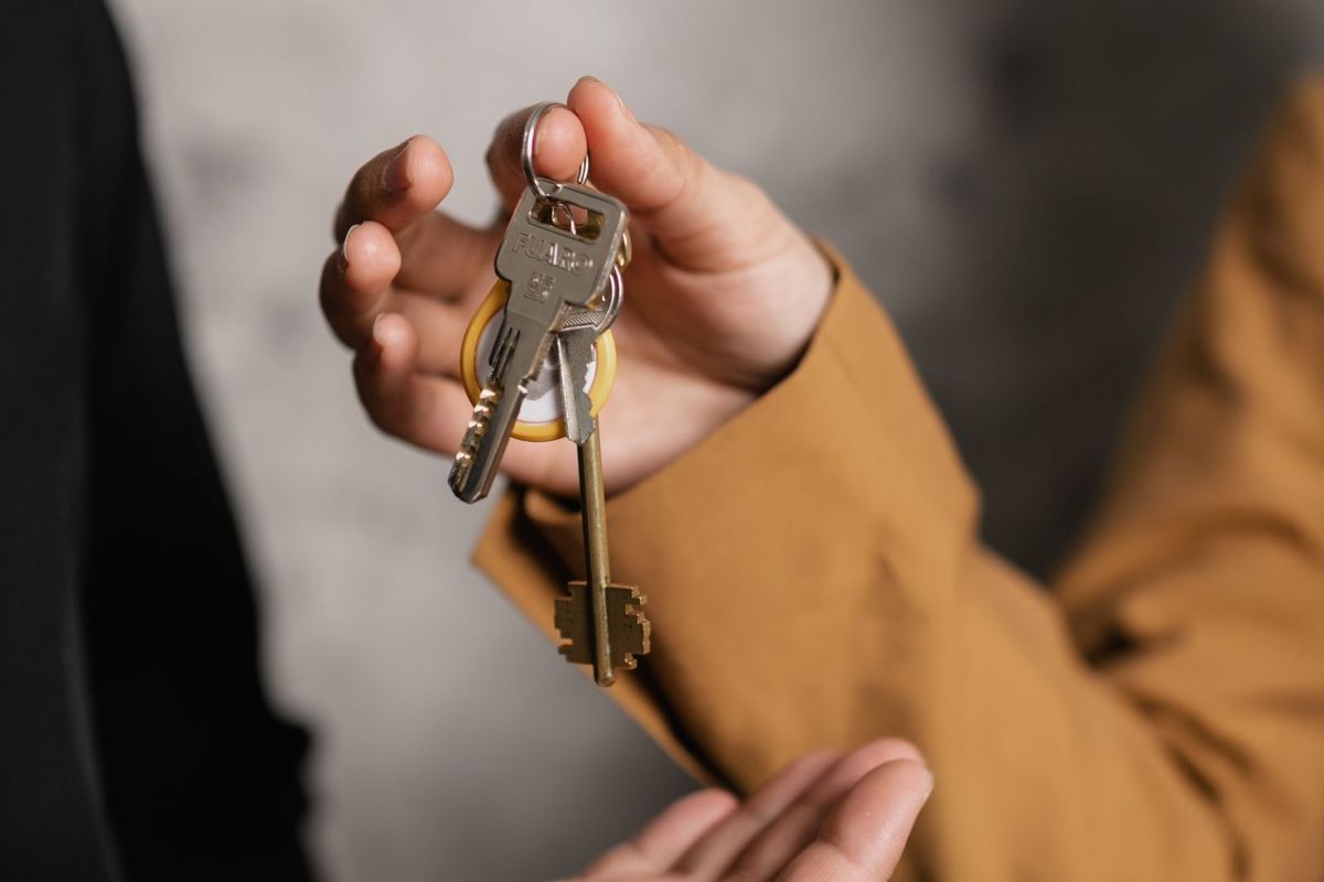 How to Avoid Bankruptcy — keys handed to a buyer
