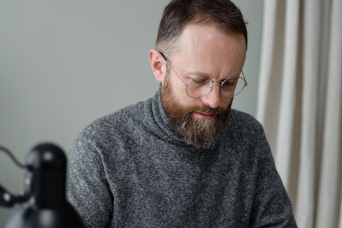 Bankruptcy Alternatives — man in a sweater counting money