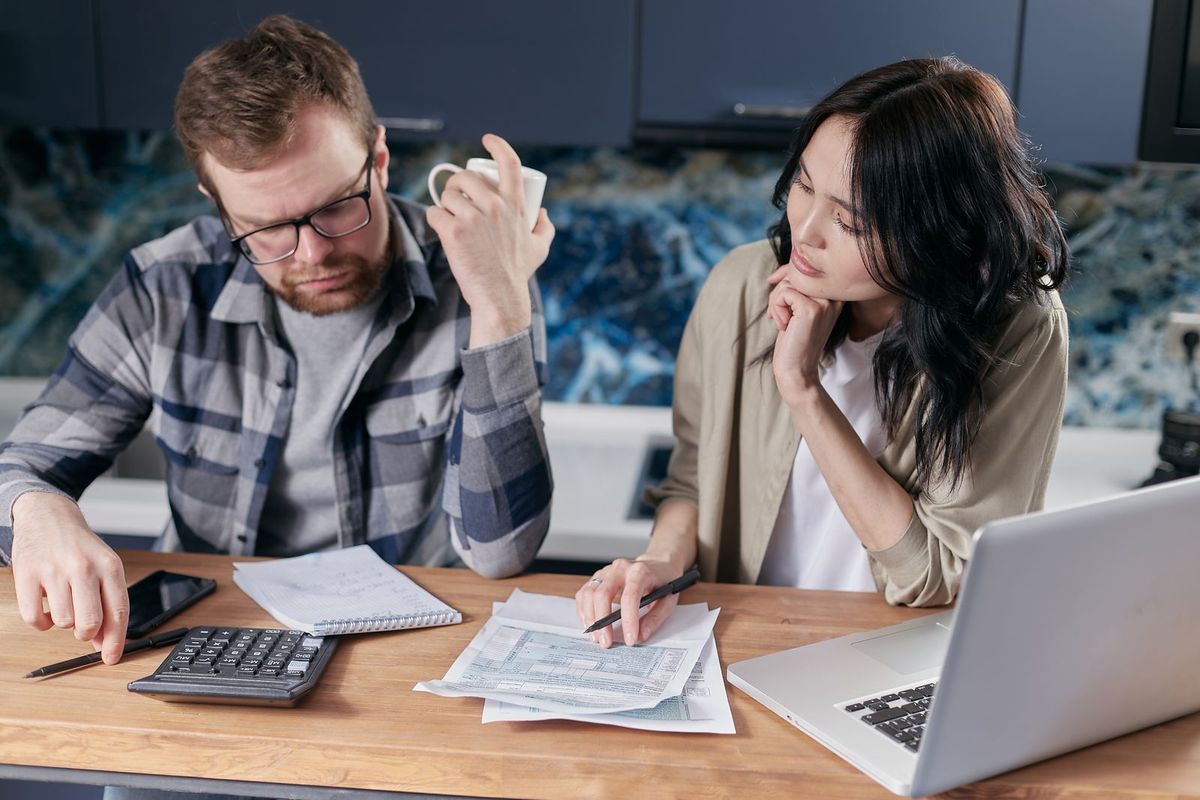 Alternatives to Chapter 7 — couple budgeting on a laptop