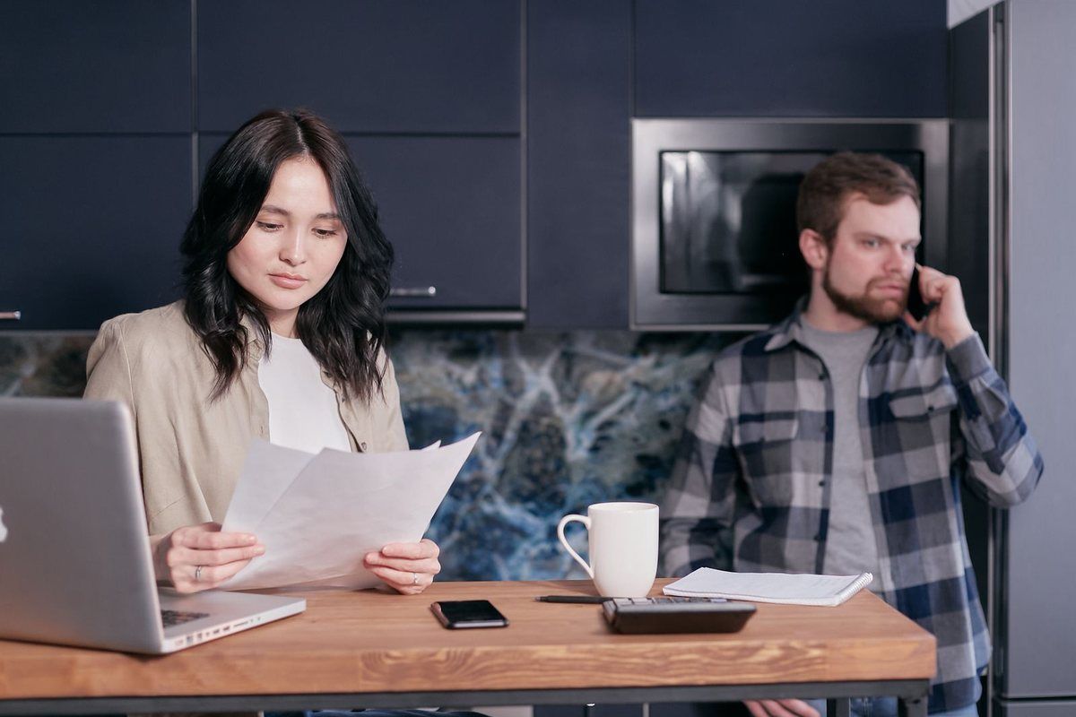 How to Avoid Bankruptcy — woman looking at documents