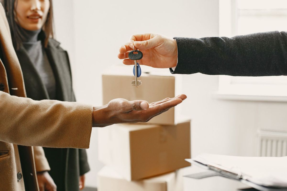 Debt Negotiation Services — keys handed over on moving day